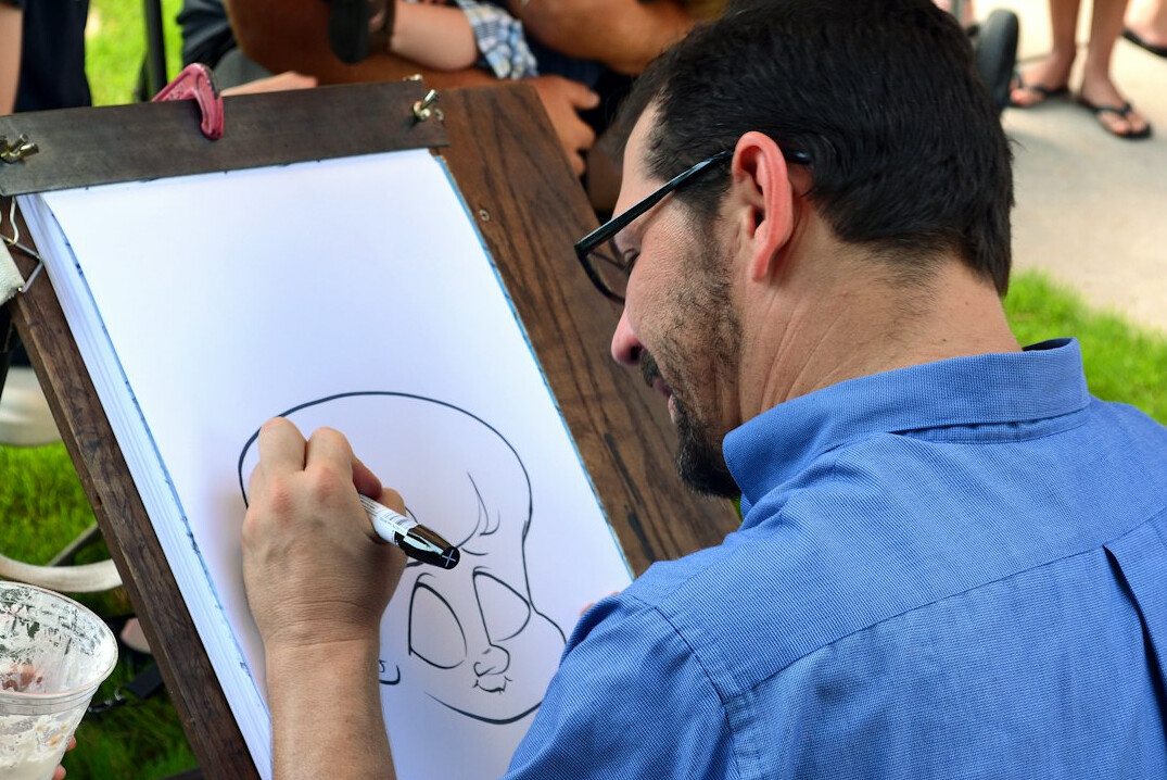 Instructor writing on a whiteboard during a health certification class
